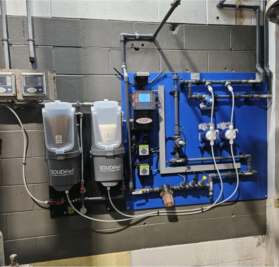 Cooling tower treatment panel with two SOLIDified solid feeders and an Advantage controller, installed by Hoffman Water in Ohio