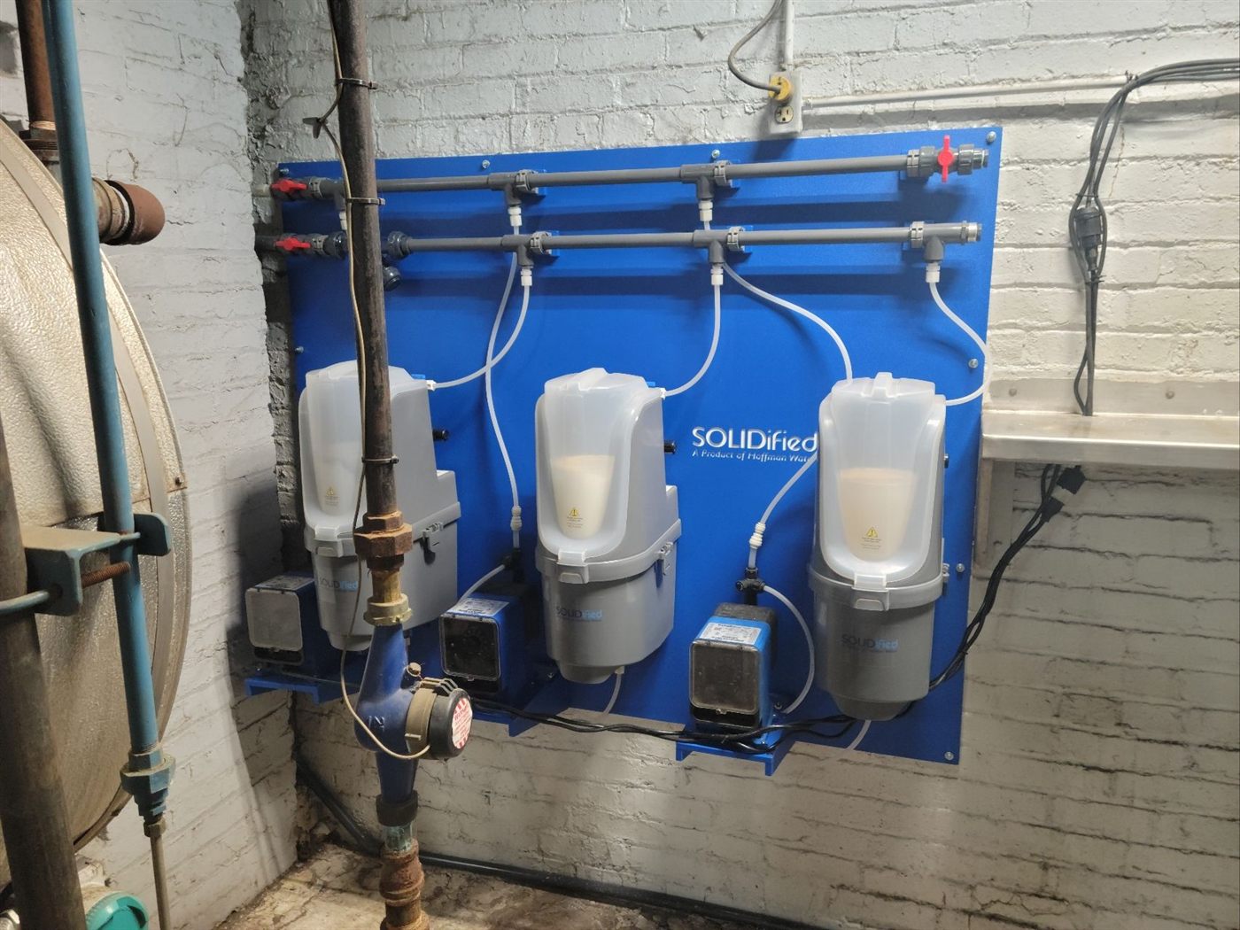 Installed SOLIDified solid chemistry system on a Hoffman Water feed panel